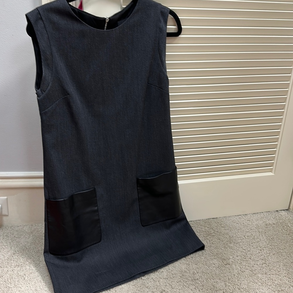 Grey dress with leather pockets